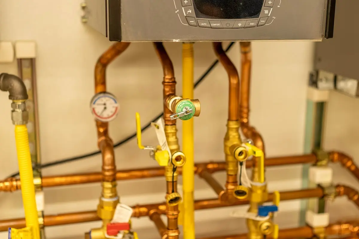 Licensed technician providing Backflow Prevention for a homeowner in Saline